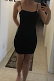 Love the material, it is thick and soft. I'm debating not wearing a bra with it as it does not seem that necessary! Fits great and molds to your shape. The material has very thin ribbed lines which allows it to be dressed down or up! Would buy again. - Morgan M.