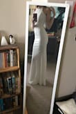 I saw a dress almost identical to this one on a bridal site for $1,900. At $80, this is the steal of the century! I am so happy with the material, the beading, and the fit. I am planning to get some shapewear for underneath it because the dress is VERY unforgiving and shows every little bump (or in my case, my belly button lol), but I am so happy with the dress otherwise. I don't need any alterations or anything! - Meagan K.