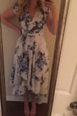 This dress was perfect for a summer wedding. It is a little low cut in the front so I had to pin it, but otherwise the small fit very well. - Shelby C.