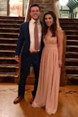 I wore this dress to a wedding and loved it! I got so many compliments! I always need breast support since losing a bunch of weight so I actually duct taped my breasts in place and I felt so comfortable in it! Even with the plunging neckline the dress stayed in place and I was able to dance the night away. I'm 5'2 so it definitely needed a hem. The skirt portion of the dress is extremely roomy so I recommend buying for your waist and bust size. Thanks again Lulus!! - Simone C.