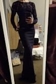 I love the dress! It is a little snug but I would not go down a size. It looks great on and for the most part easy to move around in. The material is light and NOT see-through! - Jacey K.