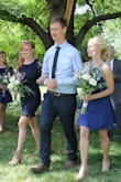 Got this for my sister's wedding. I was having the hardest time finding a pretty navy blue dress that was short. Goes right above my knees and the waist fits perfectly! Super awesome dress. I wanted this so that I could wear it for the wedding and some business tradeshows.

My sister (on the left) can be seen wearing the dress for a wedding. She is 5'1". - Jenna D.
