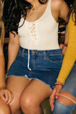 It can be as short or long depending on whether you wear if high waisted or not. Kinda retro kinda modern - Sylvia L.