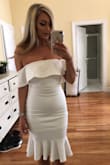 I am obsessed with this dress! I wore it for my bridal shower and it fit like a glove. The material is so stretchy and comfortable and it hugs your curves in all the right places. I got so many compliments on this dress I wish I could were it again! - Amy R.