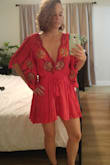 Make sure you know your Free People size! There are long slits all the way up the arms. Its very 'flowy' so windy days are out. It is extremely short. It is a dress not a romper. I haven't figured out which shoes to pair this with, maybe a boho sandal. I haven't worn this out yet either, it is extremely low and requires fashion tape. Seems like I may be too petite to pull this off. My butt lifts the back end up also to make it shorter than the front so be careful if you're curvy. - Rebecca T.
