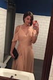 The dress is BEAUTIFUL. It looks simple but it is high quality and would suite any body type. I got a TON of compliments.
However. If you're in between sizes or aren't sure, size down. It was loose around my already flattish chest when sitting so I HAD to wear a bra and safety pin it. It has a LONG ass hem so I'm going to get it professionally hemmed.
All in all beautiful. Should have gotten the XS though! - Katja K.