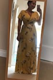 Fits absolutely perfectly. I wish the other wrap style dresses on this site fit like this one! The fabric is perfectly flowy and the color is gorgeous. I kind of want to buy it in every color - Rachel Z.