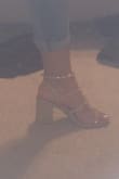 They ran just a tad bit small and when walking your foot will slip down even more cause it's slippery leather. Which makes toes look like there almost touching the floor but I still love. If I order the black ones I will order size 8 I ordered 7.5.. - Gloria J.
