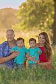 I wore this dress for family photos. Its well made and high quality material. The skirt is thick and full. I felt gorgeous wearing it and think it would be flattering on all sizes. Definitely recommend. - Kim W.