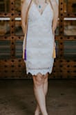 This dress was really nice! I used it for my grad photos and might wear it to graduation. I did have to get this hemmed but now it's perfect. The V at the chest was deep and it looks better on people with smaller boobs, with boobs it just looked scandalous. i also got the the bottom laced hemmed because i didn't like the look of the extra fabric without the nude slip. All in all this dress was perfect after alternations. So happy with it - Lexi N.