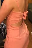 I bought this dress for my boyfriend's formal and loved it! It was a little long so I hemmed it and it was fine. If your hips are over 38 I'd definitely get a medium or large it was a bit snug but the top fit nicely since it was easy to adjust. - Mae B.