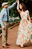 I wore this to my engagement photo shoot and got so many compliments! It fits beautifully except that it was super long. I had to get it hemmed up several inches, but that's not an usual for me. Most of my pants and long dresses need to be hemmed up. Giving it four stars only because I wish it came in a petite size, but otherwise it's perfect. - Debora D.