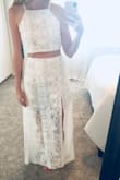 I typically wear a size 4 on top and 6 on bottom. I ordered the medium and found that the skirt fit perfectly and the top is a little loose but it's not too noticeable and still looks cute. I also like that the skirt waistband is stretchy. The lace is thick which gives the dress more of a boho vibe and feels more casual. I knocked off a star because typically lulus clothing feels like better quality than this, the skirts are usually much longer (even on us tall girls!) and this one sits a couple inches off the floor on me. - Heather W.