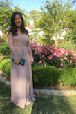 It is a beautiful dress! I wore it to a formal wedding and got compliments all night long. I felt beautiful in it. This was my first purchase from Lulus and I will be shopping here again!

The dress is really long, as I am short. I had to get it hemmed 5 inches and even with my 4inch heels, it still touched the floor. The sleeves were long too, I had to cut the sleeves off a little. 

The backless made it difficult to wear any kind of bras with it, you might have a hard time if you have a heavier chest. I couldn't go bra-less because my girls would look sagged, and I struggled to find bras. I ended up wearing sticky bras, but they still didn't hold the girls up right. If you have a lighter chest or are willing to go bra less, this dress would be look so amazing on you. - Thaian N.