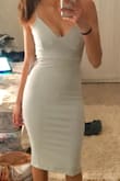 This dress is definitely tight and you will need spanx, but it is so cute! The fabric is good quality and thick. Length goes well below the knee. The light blue color is more blue gray and doesn't look quite like the Lulus photo. Ended up returning because I found another dress, but still thought this was cute! - Lizzy D.