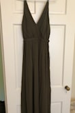 I absolutely love the cut and fit of this dress. However, the color of the dress in person is a lot darker than the picture on the website. I still love the dress and will be keeping it for an up coming wedding, but I was hoping for the lighter color to make the dress seem a little more summer-y. - Ally D.