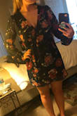 Although it looks a little different in person I still love it! I was nervous about ordering a small because of my hips but I have plenty of room!!! Super cute for a wedding I have coming up. Also a perfect length for short legs too! Although the sleeves are a little long I'll roll them up like in the picture! - Ariel L.