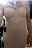 I loved this dress when seen online. After reading such positive reviews of Lulus, I decided to order this dress for my small wedding. It fit me like a glove except for the length but being only 5'3" I knew I would have to have it hemmed up. The overall quality is great for the price. It has a pretty heavy under fabric and was not see through at all. No bra needed either and felt supported. I felt sexy in this dress but I just knew it wasn't the dress for me. The main reason for returning is the zipper. It just didn't lie flat when zippered up, it had a strange bulge that drove me crazy. I am returning but ordering a different dress from lulus! I would recommend for sure. - Dana R.