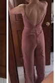 I love this jumpsuit.! Ordered an XS and it fits perfect. Color is pretty and straps are adjustable no need for a bra. - Kelly A.