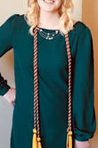 So I wore this dress for my graduation and it worked really well. The only problem I had with this dress was when I was sitting down. It would ride up and felt very tight and uncomfortable. - MaryAnne G.