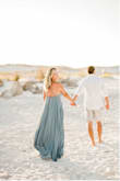 I got so many compliments on this dress! Wore it for engagement pictures. I'm 5'10" and still plenty long. - Lisa H.