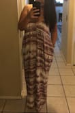 I'm obsessed with this dress. I'm literally ready to order the other two colors. It does fit large, I am typically a size 10 dress/pant and medium/large shirts, and while I expected to need to order this dress in M/L, I ended up ordering the S/M after reading several of the reviews. The fit is great, still plenty flowy on me, and the fabric is so lightweight and comfortable. I basically plan to live in this dress all summer long. - Alexa F.