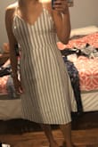 This dress it super flattering and fits great. Plus it has POCKETS! Love it so much. - Liliana L.