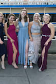 I wore this for prom and I loved it! It fit nicely and was very comfortable. It was also very breathable and has a leg slit. The only thing I would say is because it was flowy, some angles were not that flattering. - Kate T.