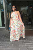 The dress is BEAUTIFUL and I got a lot of compliments, BUT... 1) it runs small in the bust area. I originally ordered a L but couldn't even zip. Then I ordered a XL- was able to zip and it was perfect for my boobs, but was a little big in other areas, particularly on the sides/armpits. 2) Its VERY long. I'm pretty tall (5'6") and I wore a 3 inch heel and still had to hold it up at times.
It's a great summer flowy dress, but will require some adjustments. I'm keeping and will def wear it again, will just get it tailored and then it will be PERFECT! - Erinn M.
