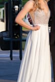 I wore this dress to prom and it was perfect!! It was a little big on the top so I got bra inserts so it would fit better. It was very long but with heals it was fine. Overall I really liked this dress and would recommend to everyone - Maddie D.