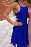 I absolutely LOVE this dress! I got so many compliments in it as well! The color is amazing, the tie in the back is such a nice touch. I would add that the neckline on the sides does come in a bit [little less breast coverage] but this was not an issue for me. - Lydia H.