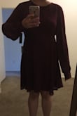 The material is really nice. I liked the length of the dress but since I needed to get a bigger size because of my waistline, ended up with extremely long sleeves that I had to pull up the entire time at the party. As seen on the picture, it goes way beyond my entire hand. I still loved it regardless. - Princess B.
