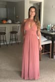 This is the 3rd dress I have ordered from Lulus for a wedding (I wish the bridal parties I'm in would order from here - I know I am). Each time I've purchased a Large BC I'm quite tall and each time I've never had to do any alternations. This dress in particular is so comfortable and flattering. I normally wouldn't buy such a low cut dress but this time I did and I'm not regretting it. I'll be wearing this to a Spring wedding on MDW! It really is so comfortable and the color is much better in person. I like that it's not form fitting and I'm able to move in it sooo freely. - Olga B.