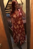 This dress is incredibly beautiful and I'm so happy to have found something that fits my body and looks good. It's great quality & feels good on. It shows quite a bit of cleavage but easily pinned to show less or a cami or bandeau can be worn underneath. - Chelsea G.