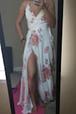 This dress is really beautiful and elegant, I ordered a x small size and it fits perfect because you can adjust it, it's really large on me so I had to altered it. - Lina C.