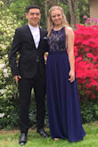 The dress was gorgeous. Even better than the picture online. It felt well made & fit perfectly- just a little long. We got it hemmed & it was perfect. - Corey S.