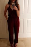 I loved this jumpsuit and the small fit perfectly but then I washed it and the whole thing shrunk a little. I would recommend hand washing or air drying if you buy. - Gaby M.