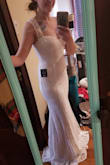 Love this dress! I was a little nervous ordering a wedding dress online, but after trying it on its even more beautiful in person. It fits great, although the bottom is long and will need to be hemmed. Overall, an amazing dress that will need minimum alterations. I can't wait to wear this for my destination wedding! - Krista S.