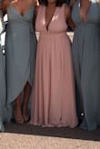 Bought this as a bridesmaid dress. Absolutely loved it fit a little large around my chest area and was long but a quick fix when I took it to get altered. - Celeste H.