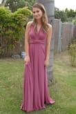Got this dress for the prom and it was a really nice heavy quality dress. Used the steam iron and it was ready in minutes. My daughter had on 1 1/2 heels and it was just a little bit long but it worked out well. Got her the XS and it fit really nice. Would buy this dress in another color for any event. You can look online to see all the different ways you can wear this dress. Its easy and fun to try all the different looks. - Margaret F.