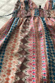 The colors in this dress we're not AT ALL what I wanted/expected.  This dress has a bright oranges & and Brown color to it.  I was hoping for the light pink/blues.  But the orange & browns are very dominant.   I decided to keep it because it does fit well. - Lisa M.