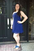 Fun little dress, fits perfectly! The fabric has a nice flow and rich navy blue color. My daughter received many compliments! - Summer R.