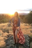 I've gotten compliments every time I wear this dress, it's comfortable, flows beautifully, and because it wraps can be worn more modest or sexier. The length is great on the medium. - Lisa H.
