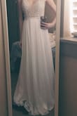As soon as I opened the box I knew this dress was going to be perfect for my wedding reception. It is sturdy, well-made, and the beading is intricate enough to keep it from looking tacky. A size 2 was perfect for me and will be so comfy to dance in all night. The straps were the perfect length for me. I am almost 5'8" and if I were going to be wearing heels I could probably get away with not having it hemmed, but since I'm going to be wearing flats I will probably have it hemmed slightly. I am so in love with this dress and everyone who has seen me in it has agreed that it's perfect! Thank you so much, Lulus! - Meagan K.