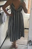 I like this dress but I wish I had ordered a size down. It was my first time ordering from Lulus and I didn't want anything to be too tight so I got a large but I think a medium would have been more flattering. The materiel is really nice. I'll just need some fashion tape in the boob area. Otherwise a nice dress and the colors are flattering (picture doesn't do it justice). - Sarah M.