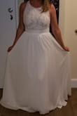 Absolutely beautifully made. The zipper was a little hard to get up, but once it was on it was fine. I felt like princess in it and received tons of compliments. - Chasity M.