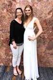 This dress is gorgeous. I usually wear a medium, but ordered a small instead after reading previous reviews. It fit perfect and wasn't see through! - Reilly B.
