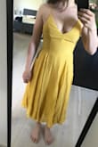 The dress is great, but if you happen to be bulky on your upper body its not gonna be flattering. The material is very nice, its enough thick yet summery. Also the style allows fitting the waist very nicely. But i really did not like how it went on my breasts so i get to return it. I just think it was a wrong style to me! - Julia K.