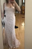 I'm 5'4" it's a little long. A tad tight in the chest but if I sized up would probably not fit. Wear to a gala or formal. - Jennifer G.