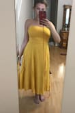 Runs a little tight in the chest but would be too big if sized up. The material seems to wrinkle easily. It would probably be better if it were longer or shorter. - Jennifer G.